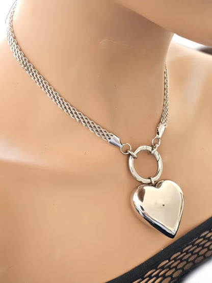 A stainless steel 3D hollow bubble heart choker pendant Necklace. Hypoallergenic, waterproof and non tarnish.