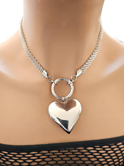 A stainless steel 3D hollow bubble heart choker pendant Necklace. Hypoallergenic, waterproof and non tarnish.